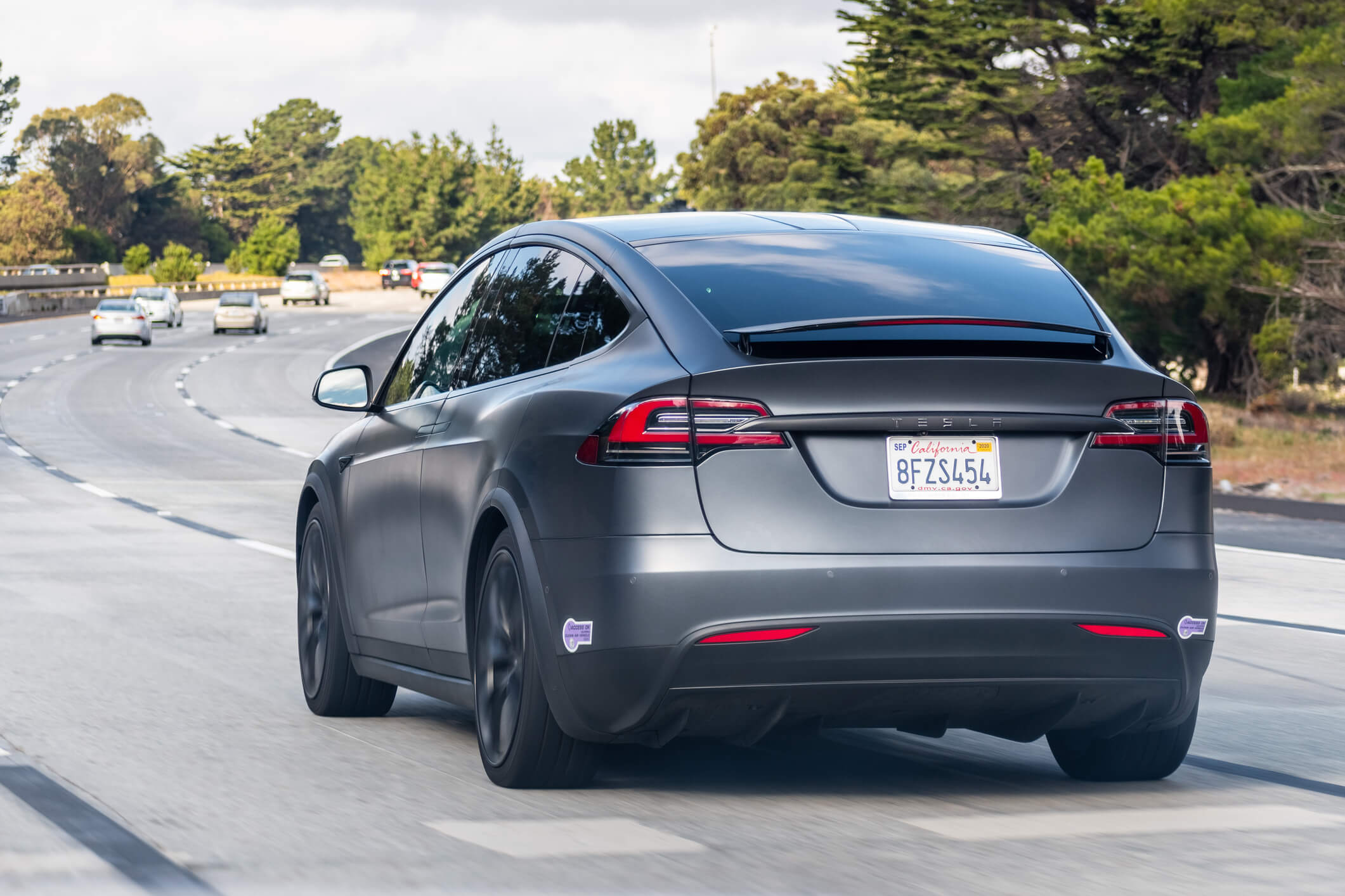 A Tesla Model X driving through Silicon Valley