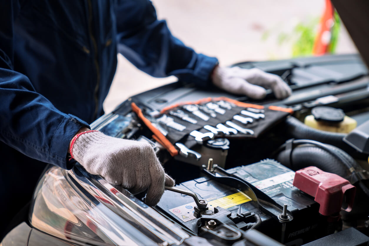 mechanic and car battery